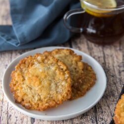 This Delicious and Easy ANZAC Biscuits recipe is an Australian and New Zealand favorite that combines oats, flour, golden syrup, butter and coconut flakes for a historical and delicious cookie.