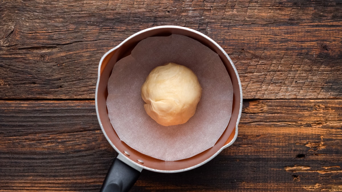 dough sitting in a warm pot