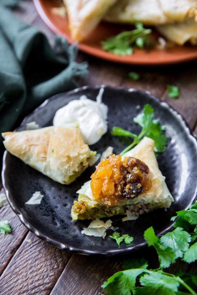 This Baked Beef Samosa recipe is a delicious combination of lean beef, potatoes, peas, sweet yellow onions and spices wrapped up in a golden pastry shell for a savory, crunchy appetizer.