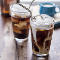 Alcoholic coffee drinks with ice on table