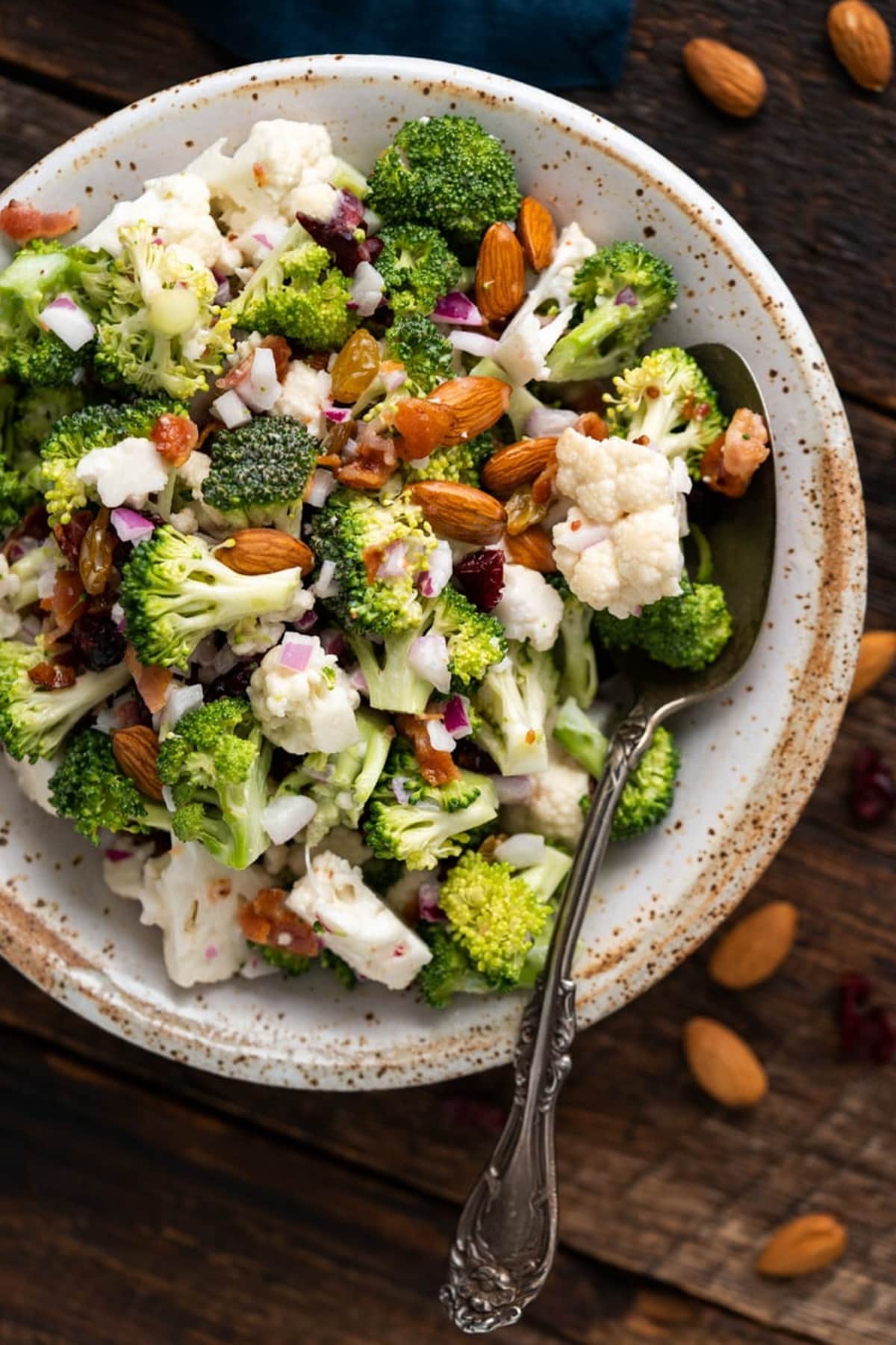 Broccoli Salad in a white bowl.