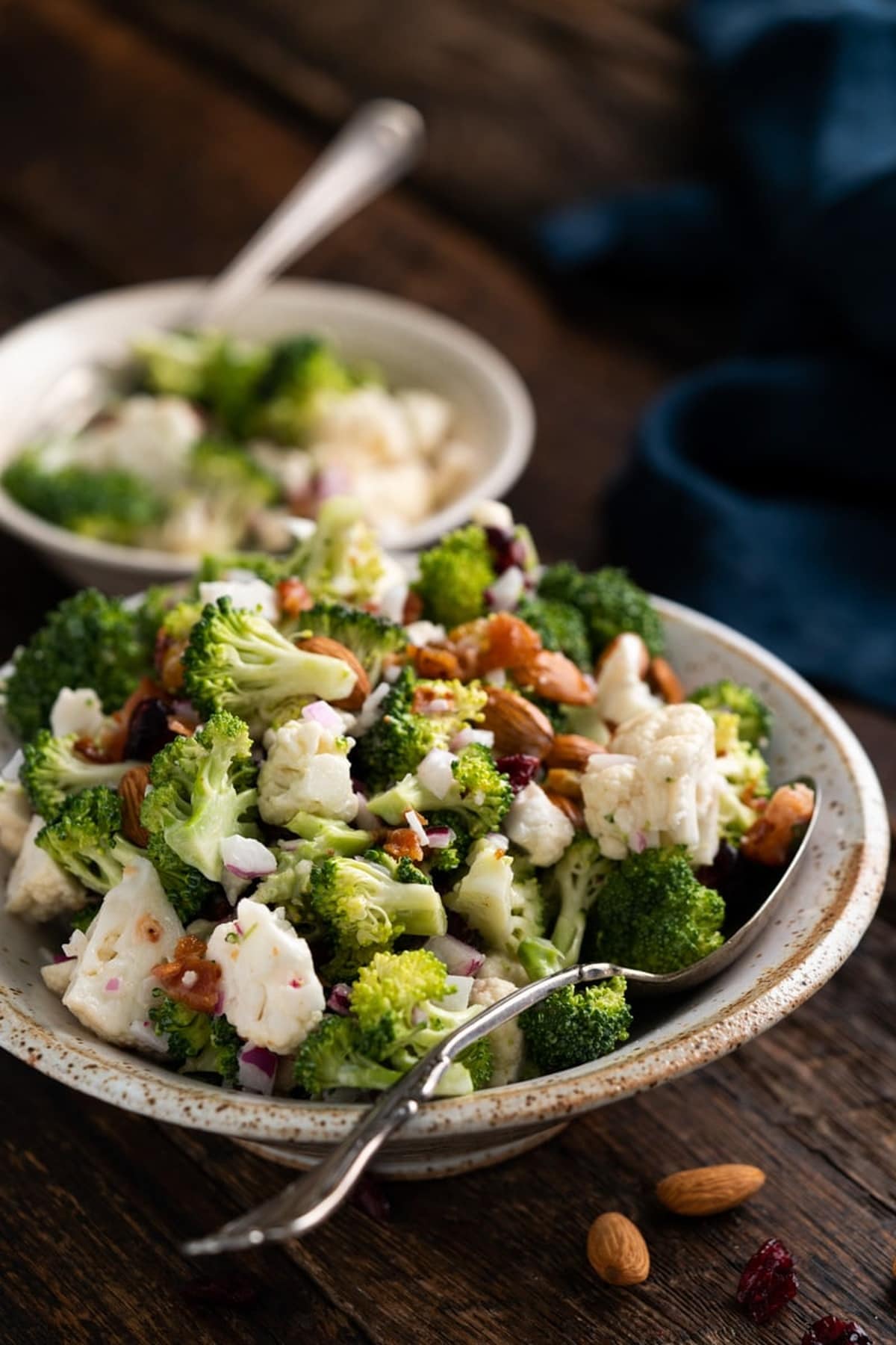 Broccoli Salad in a white bowl.