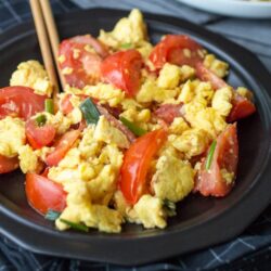 Chinese Tomato Eggs are as simple as they are surprising - perfect for breakfast, lunch, or dinner!