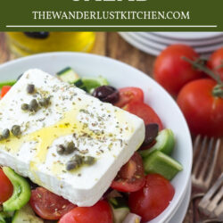 Classic Greek Salad Recipe in white bowl.