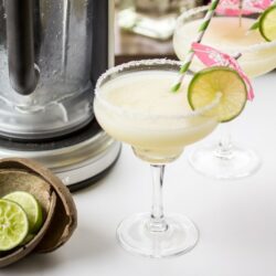 These from-scratch margaritas use lime juice and agave nectar in place of syrupy pre-made mix. Blended with coconut tequila and served with a coconut-salt rim, these tropical drinks will whisk you away to paradise!