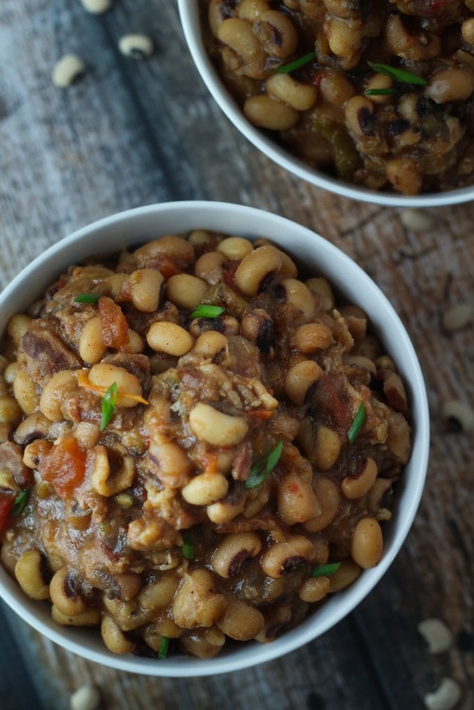 Black eyed pea recipe! Just a few minutes of prep, then everything gets tossed in the slow cooker! Black eyed peas are the perfect comfort food (especially for New Year's Day!).