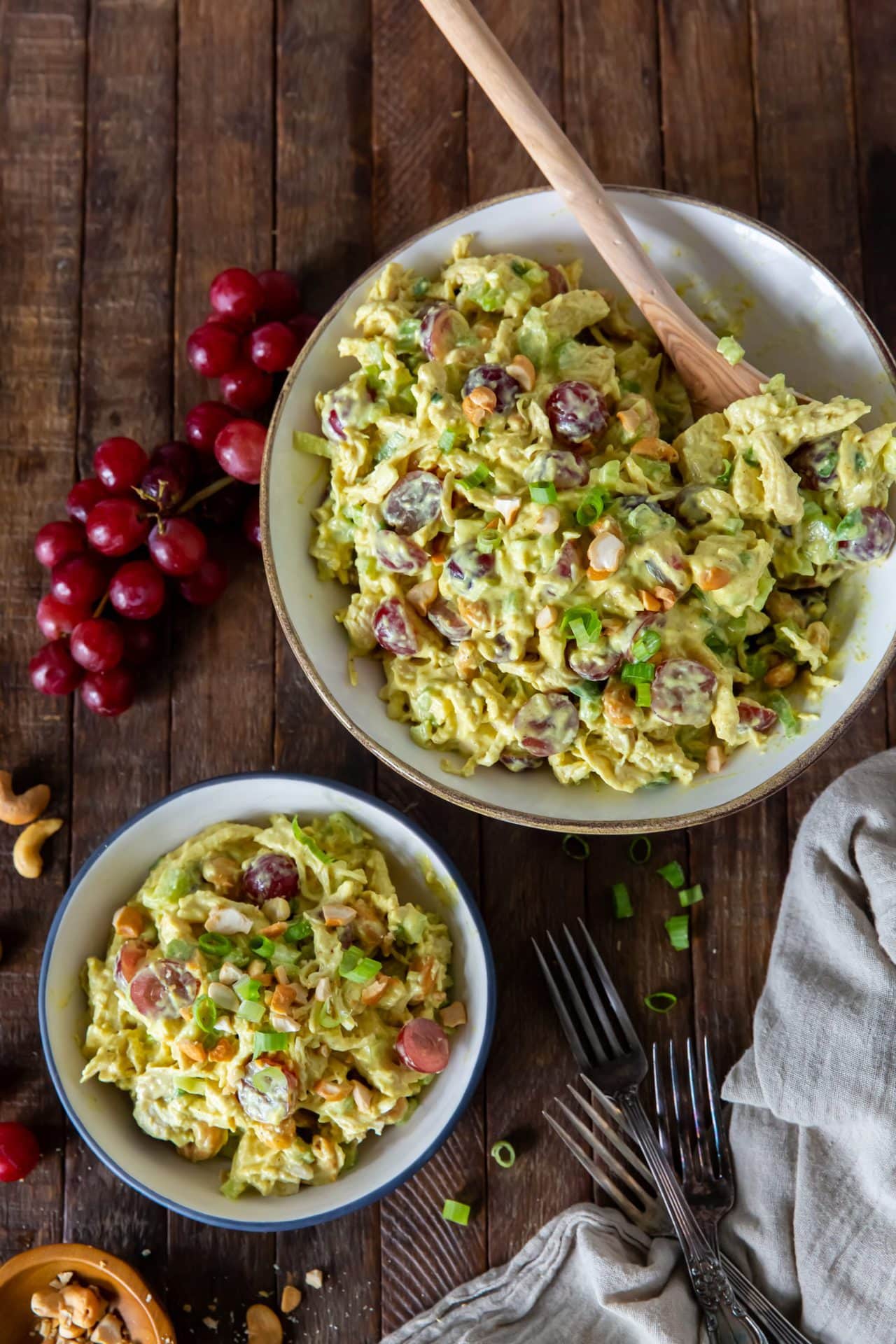 Looking for a recipe for chicken curry salad? This Chicken Curry Salad recipe is a delicious blend of chicken, savory curry powder, sweet grapes, scallions, celery and cashews for a side dish, snack or a great sandwich.