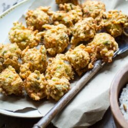 These carrot fritters are packed with feta and scallion and seasoned with a fragrant combination of cumin, coriander, and dill. Simply the best way to use up leftover carrots!