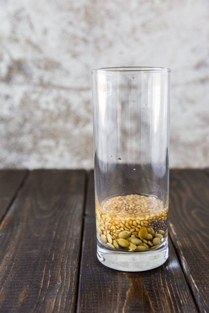 Soak the chia seeds, golden flaxseeds and raw pumpkin seeds in water for this delicious fruit smoothie recipe!