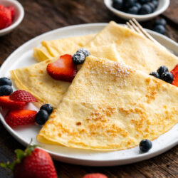 These French Crepes are the authentic light and fluffy thin pancakes that you would find in if you were sitting outside at a quaint French café.