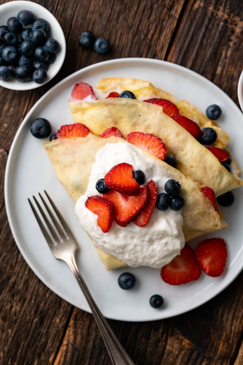 Strawberry and Blueberry Crepes on a white plate
