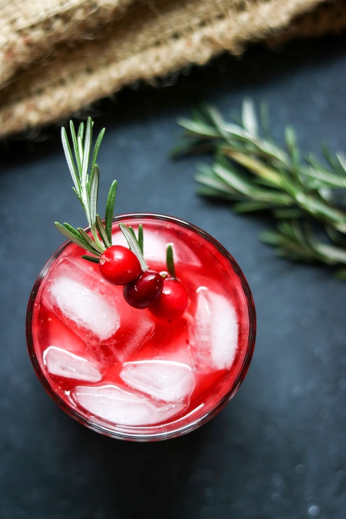 Glass of cranberry vodka spritzer.
