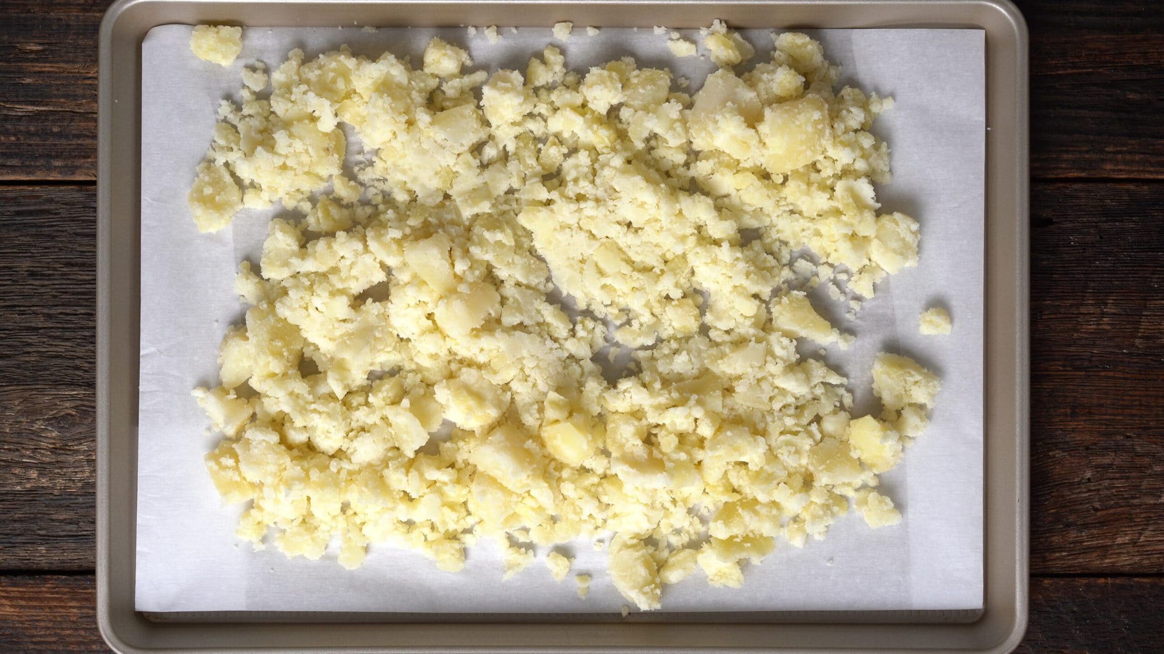 mashed potatoes on a baking sheet