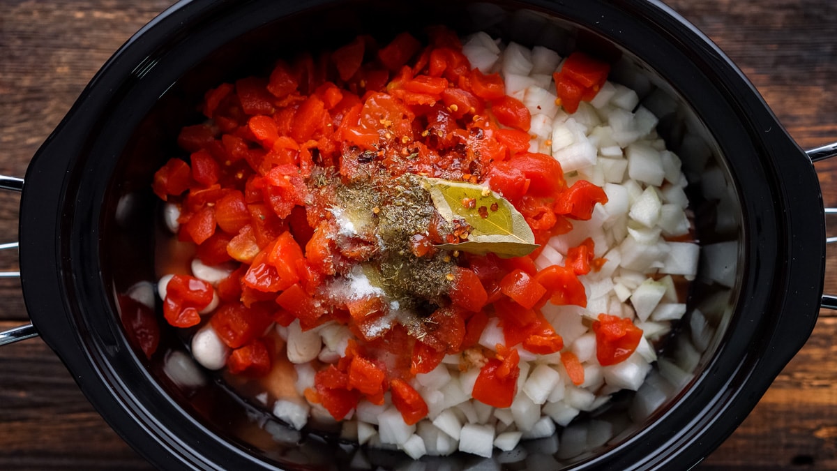 Ingredients for Greek gigantes in a slow cooker
