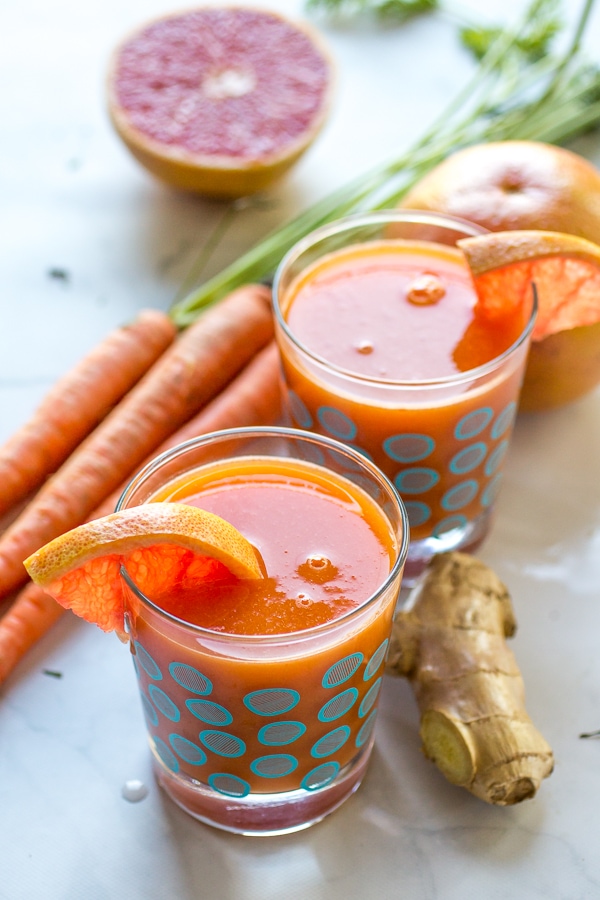 This immune boosting juice recipe blends grapefruit, mango, and carrot for a delicious, healthy drink that is perfect for those days when you feel like you're coming down with something!