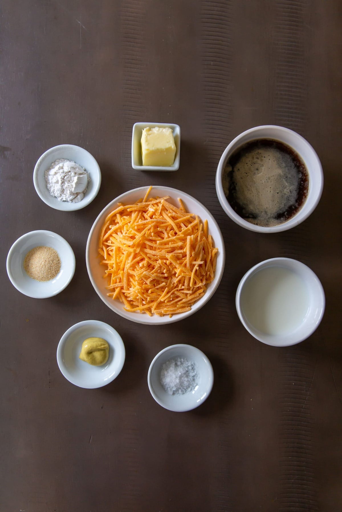 Ingredients carefully prepared for making the rich and flavorful Guinness beer cheese sauce.