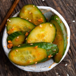 This Korean Cucumber Salad recipe has fresh and crisp cucumbers adding a crunch and with a kick of spice from Korean red pepper powder it's a great addition to any Asian meal!
