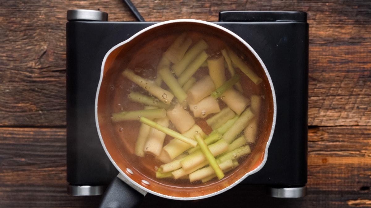 Lemongrass cooking in boiling water.