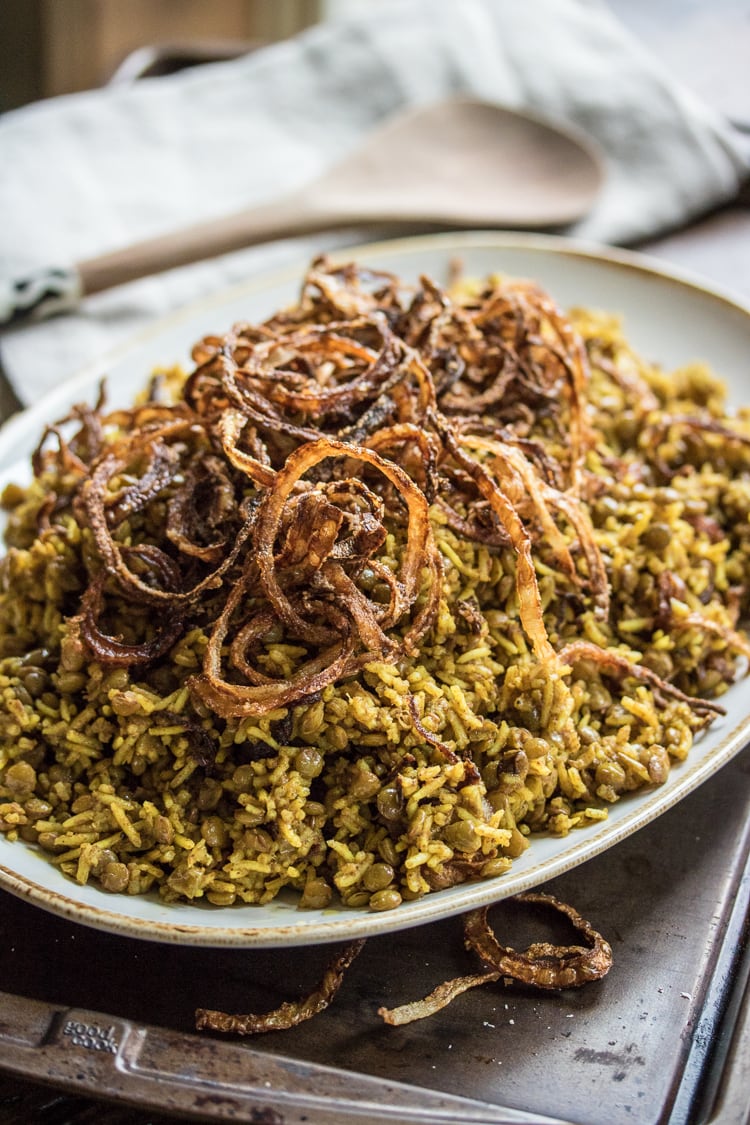 In this classic Middle Eastern Mujaddara recipe, humble lentils and rice are seasoned with warm spices and fried onions for a tasty and satisfying dish!