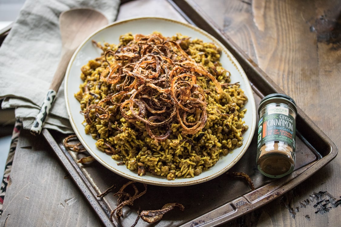 In this classic Middle Eastern Mujaddara recipe, humble lentils and rice are seasoned with warm spices and fried onions for a tasty and satisfying dish!
