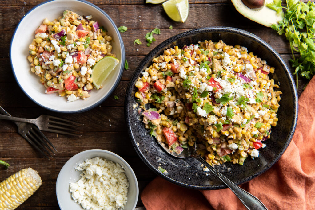 This delicious Mexican Corn Salad with mayo recipe is the perfect side dish for any Mexican themed meal or as a cool side dish to a summer barbeque.