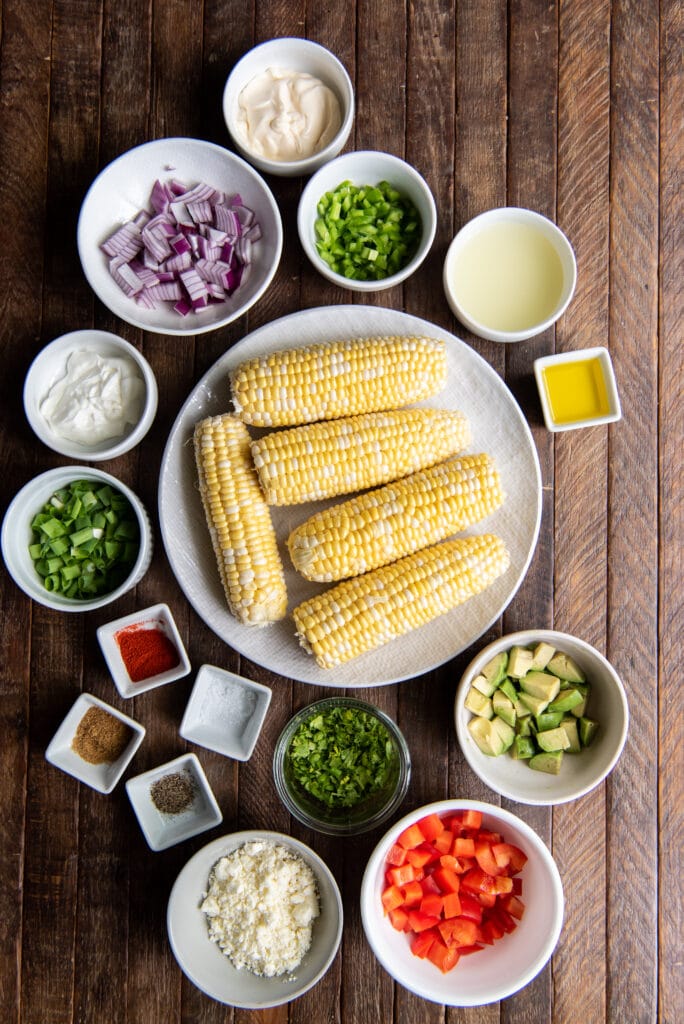 Looking for an esquites recipe? Here is a delicious one! This delicious Mexican Esquites Salad recipe is the perfect side dish for any Mexican themed meal or as a cool side dish to a summer barbeque.