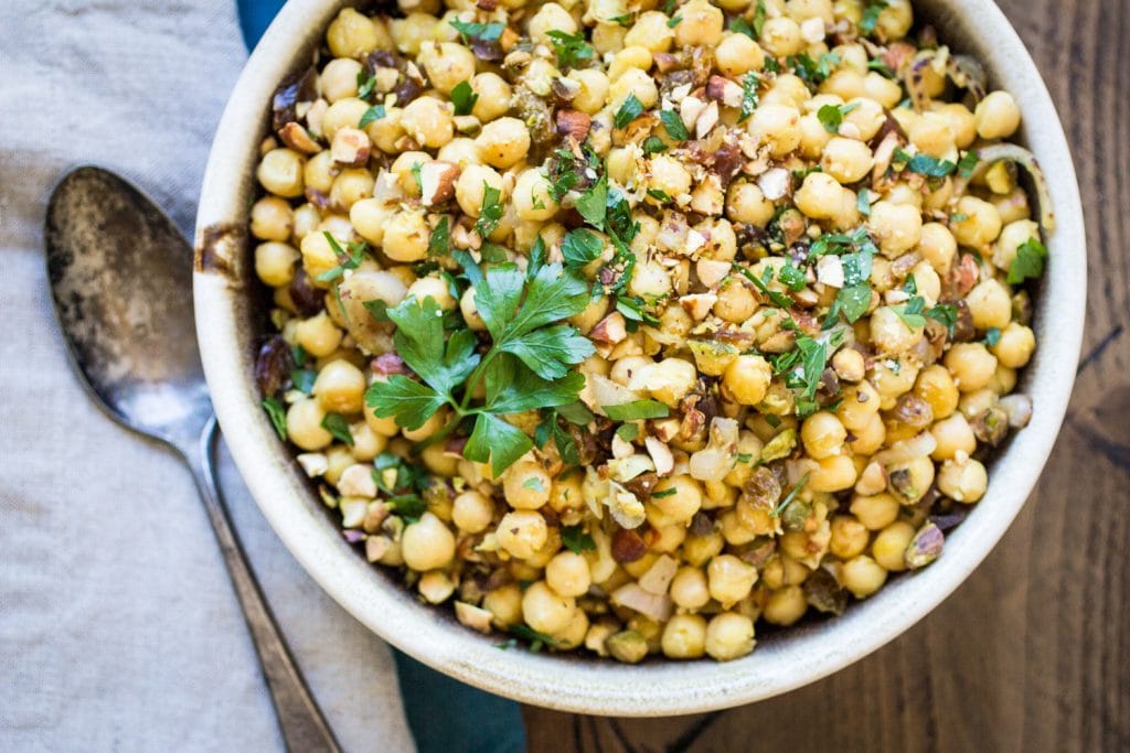 Looking for Moroccan salad recipes with chickpeas? Here is a great one to try! Dried dates and crunchy pistachios make this Moroccan Chickpea Salad recipe both sweet and savory!