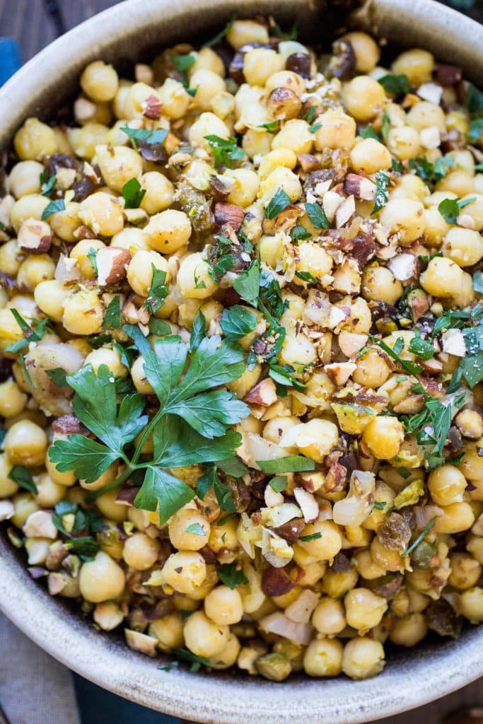 Dried dates and crunchy pistachios make this Chickpea Moroccan Salad recipe both sweet and savory!
