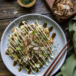 Okonomiyaki Recipe on a white plate.