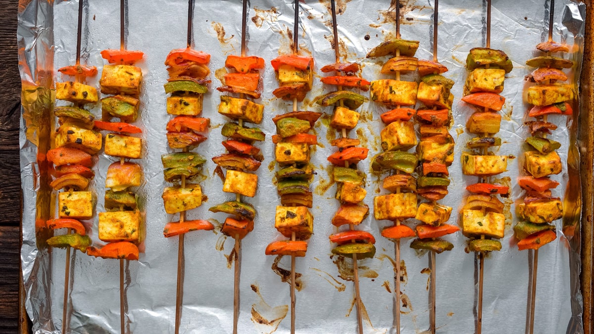 baked skewers on a baking sheet