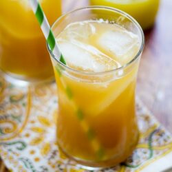 This Pineapple Ginger Iced Tea recipe combines fresh pineapple, ginger and unsweetened iced tea for a delicious and refreshing pineapple tea drink.