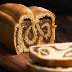 This Povitica or "nut roll" is a national Slovenian bread that is filled with a walnut spread and tightly rolled to create the beautiful swirls you see on the inside!