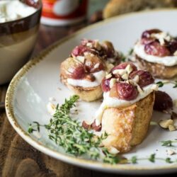 Roasted Grape Crostini with Whipped Ricotta and Hazelnuts - the perfect summertime appetizer or anytime snack!