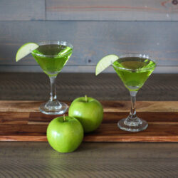 This Sour Apple Martini recipe is a classic cocktail bursting with color that will make your taste buds pucker!