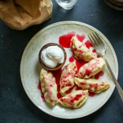 The perfect mixture of savory and sweet -- Sour Cherry Varenikis! Serve with a dollop of sour cream and enjoy this traditional Ukrainian treat.