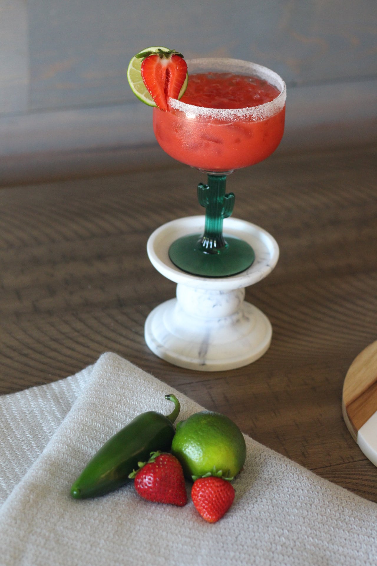 A single margarita sitting on a marble stand