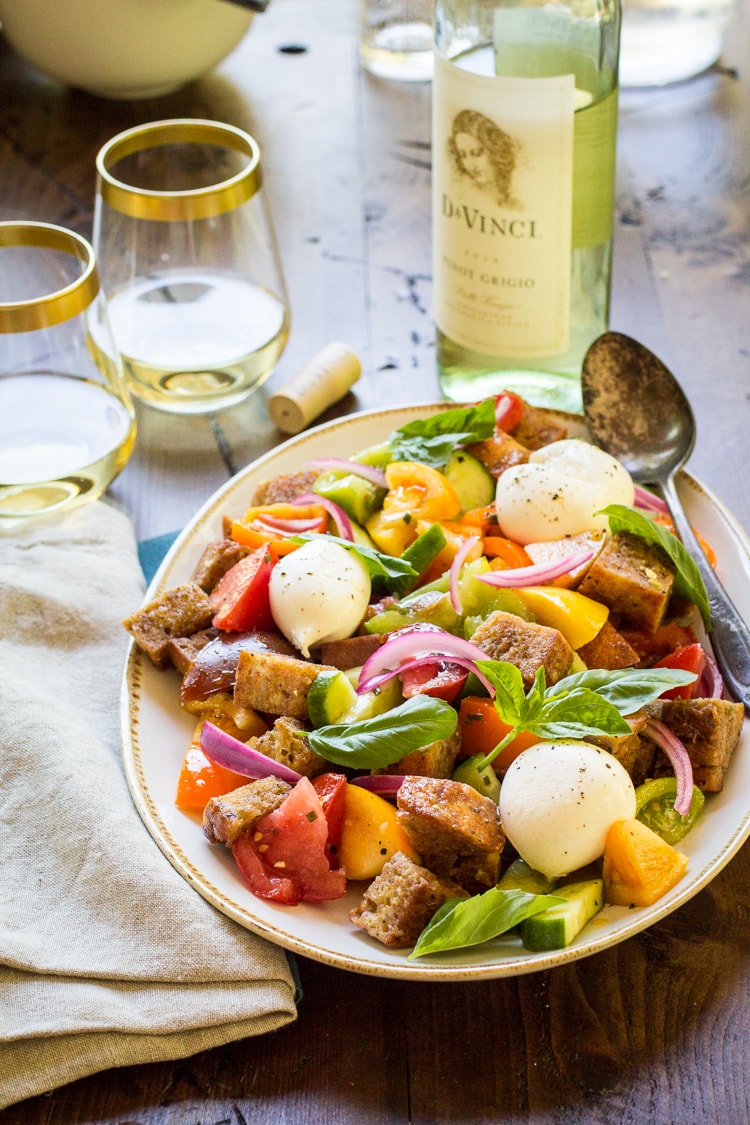 This easy Panzanella Salad recipe is a delicious mix of veggies and bread so you can enjoy the flavors of summer any time of year with this classic Italian salad!