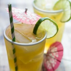 Infused gin, citrus juice, and ginger beer give this bourbon cocktail a Thai kick!