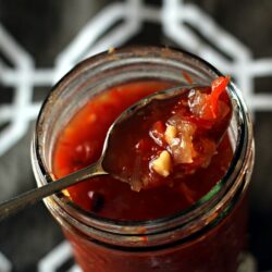 This Sweet and Spicy Thai Relish recipe combines red chilies, onion, red bell pepper, garlic, tomato, sugar, lime juice and fish sauce for a delicious, all-purpose Thai relish.