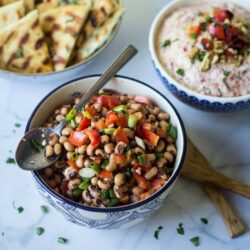 This Turkish Black Eyed Pea Salad recipe is so easy with a tasty mix of black eyed peas, red bell pepper, scallions, olive oil, lemon juice, sea salt and black pepper for a delicious side dish.
