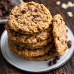 These Vegan Oatmeal Chocolate Chip Cookies are chewy, and full of rich chocolate and textured granola. You won't be able to only have one!